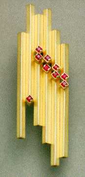 Spilla geometrica in parallelo, Oro 18 k. Doppia fila di Rubini, (pezzo unico